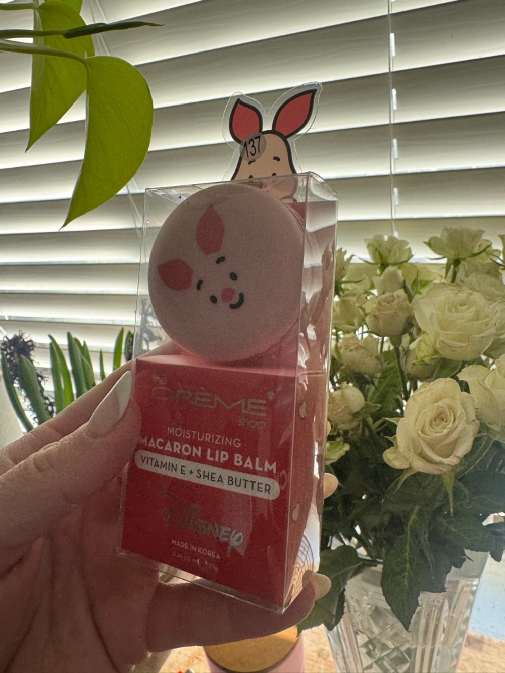 The Crème Shop x Disney Piglet Macaron Lip Balm in Rosy Watermelon